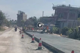 社坡二级公路开始铺设水泥路面